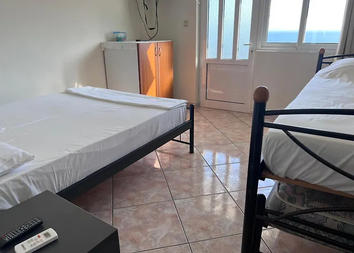 Dhoma Plazhi Husi * 博尔什